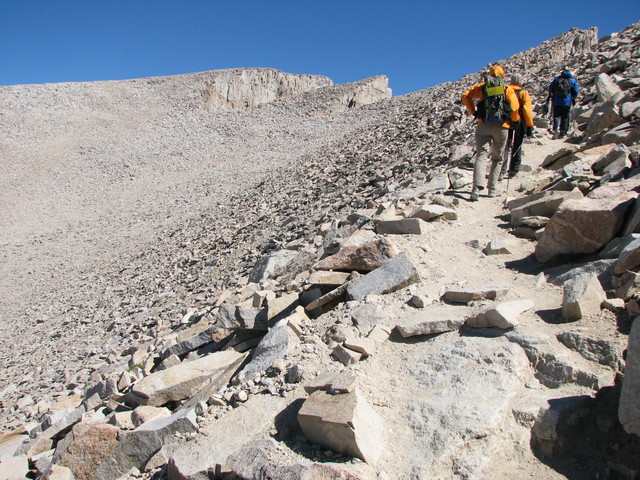 The trail up to the summit. Still over a mile from here to the top in the background.