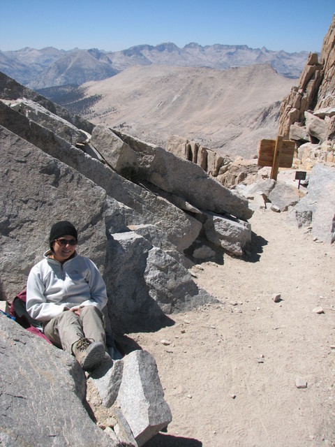 Renee waiting at Trail summit