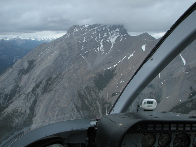 Mt Rundle from the back, partially in clouds. Heading towards Banff.