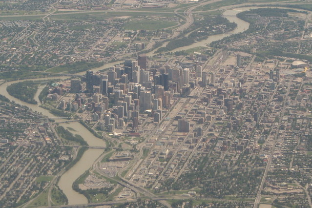 The Calgary Tower from above (upper right), and Calgary city from the plane home.  Bye bye.