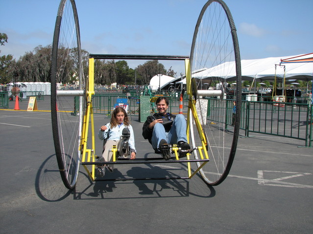 img_7803.jpg: Me riding a dicycle, the Unwheeldy